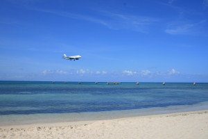 Plane Over Beach Jamaica
