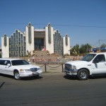 Bishkek - communist looking building(minus cars)