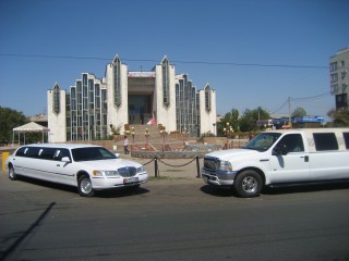 Bishkek - communist looking building(minus cars)