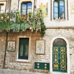 Balcony and painted door in Taormina