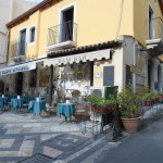 Street covered in mount Etna eruption ash in Taormina