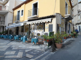 Street covered in mount Etna eruption ash in Taormina